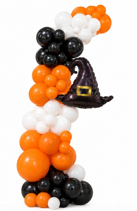 Organic Halloween balloon column in orange, black and white with a black witch hat balloon