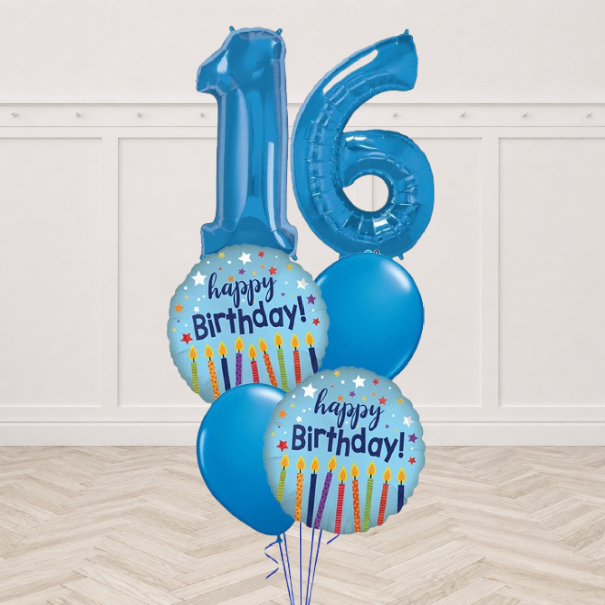 Two giant blue number balloons with blue Happy Birthday candle foils and latex