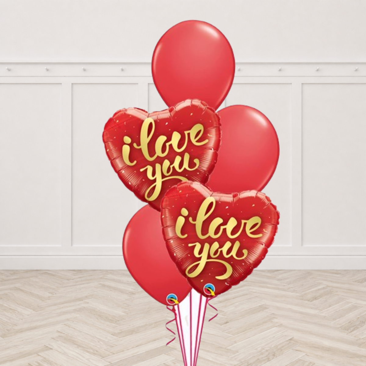 Two red I Love You heart foil balloons with three red latex balloons