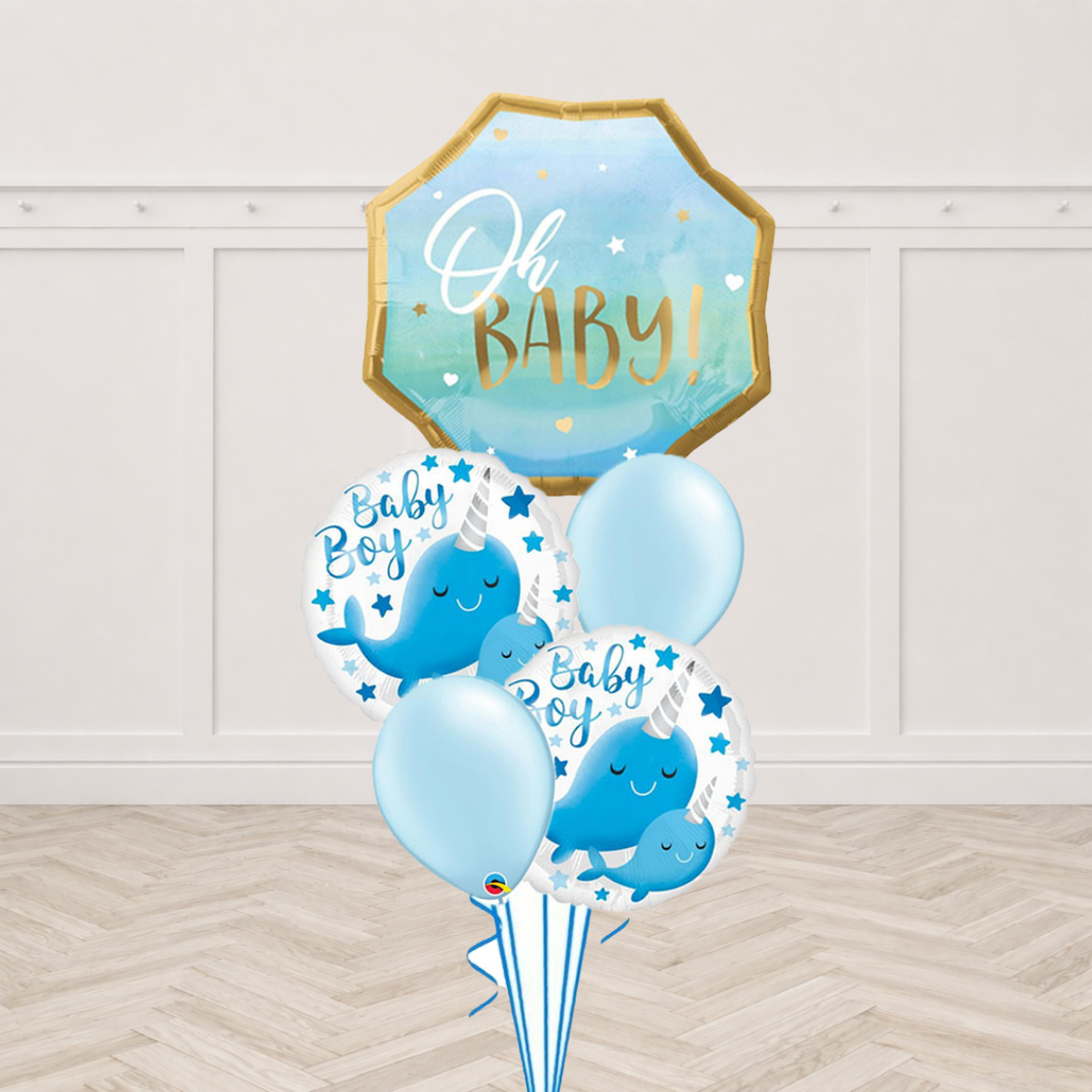 Oh Baby foil balloon with two Baby Boy narwhal round foil balloons and light blue latex balloons