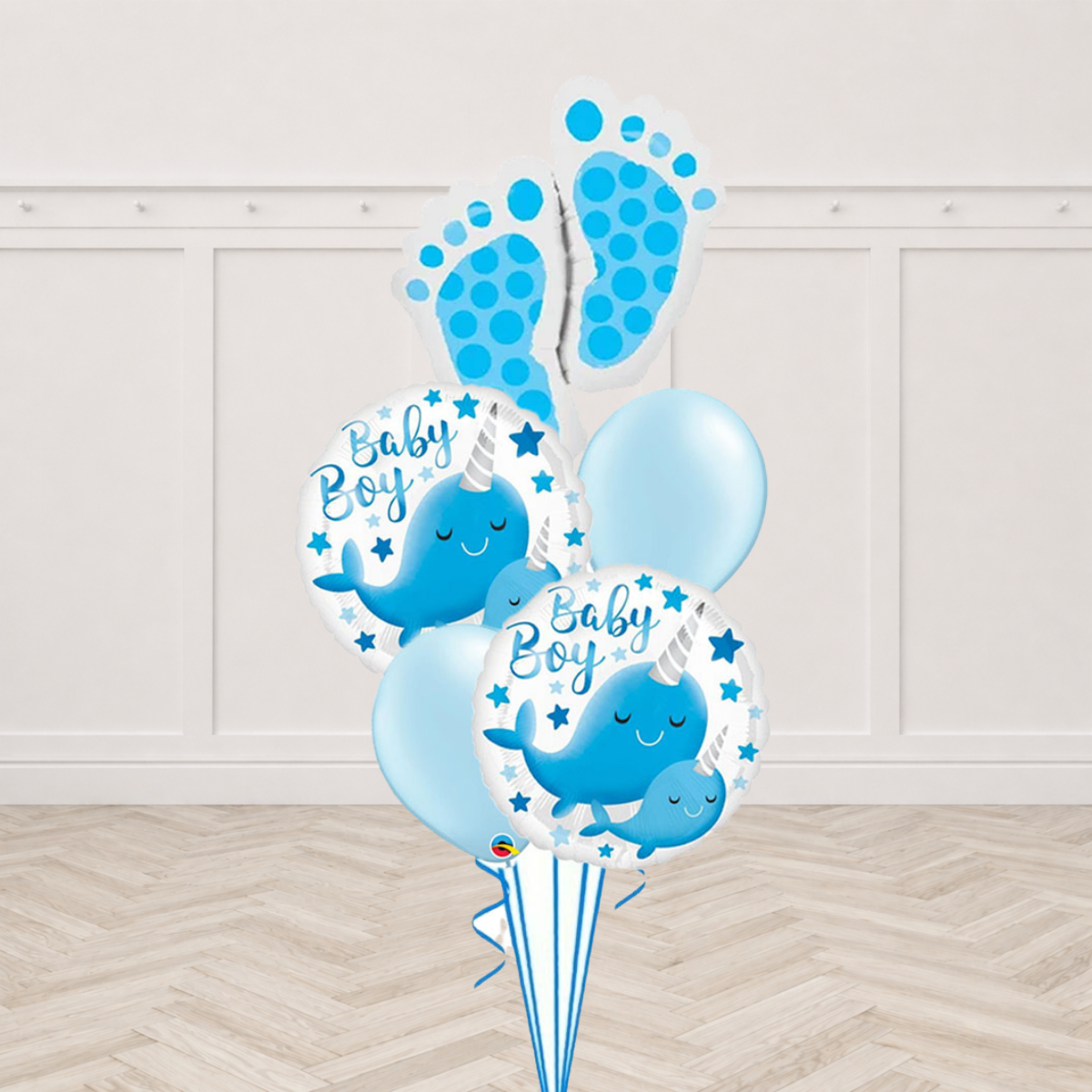 Baby footprints foil balloon with Baby Boy narwhal round foil balloons and light blue latex balloons