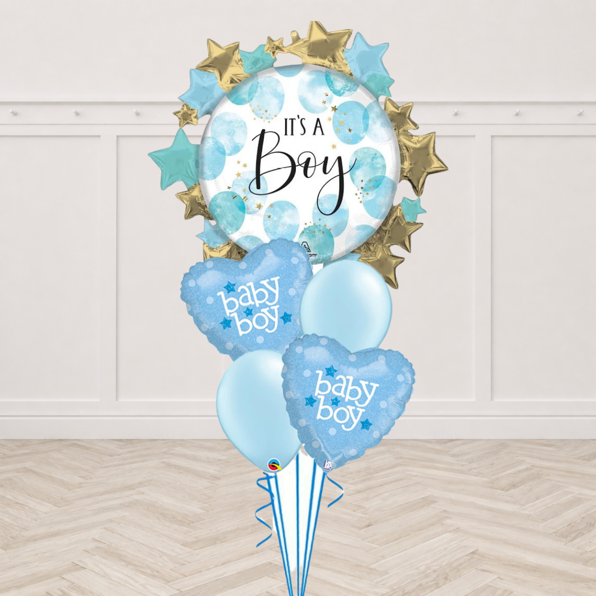 It's a Boy starburst foil balloon with Baby Boy heart foil balloons and light blue latex balloons
