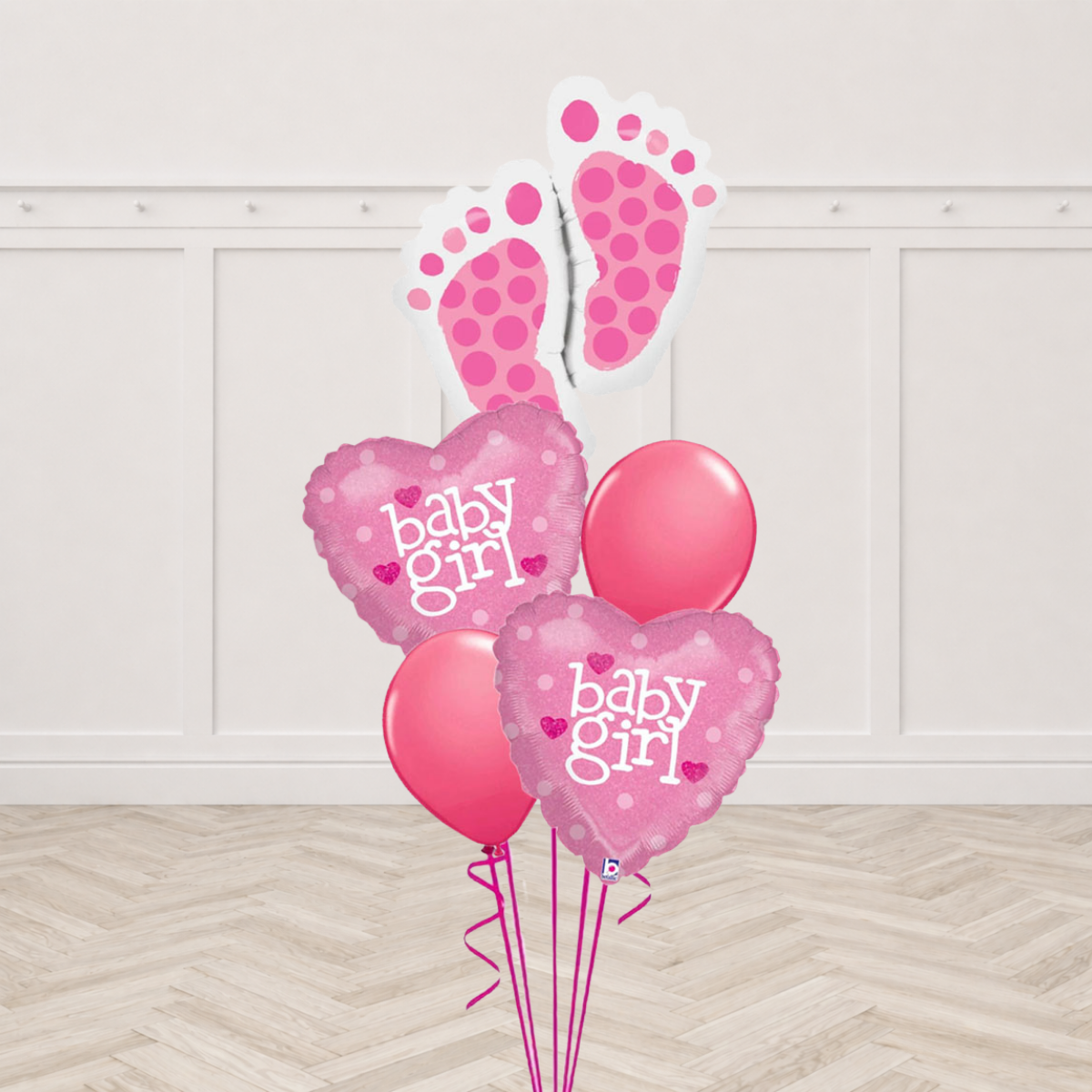 Baby footprints foil balloon with Baby Girl heart foil balloons and dark pink latex balloons