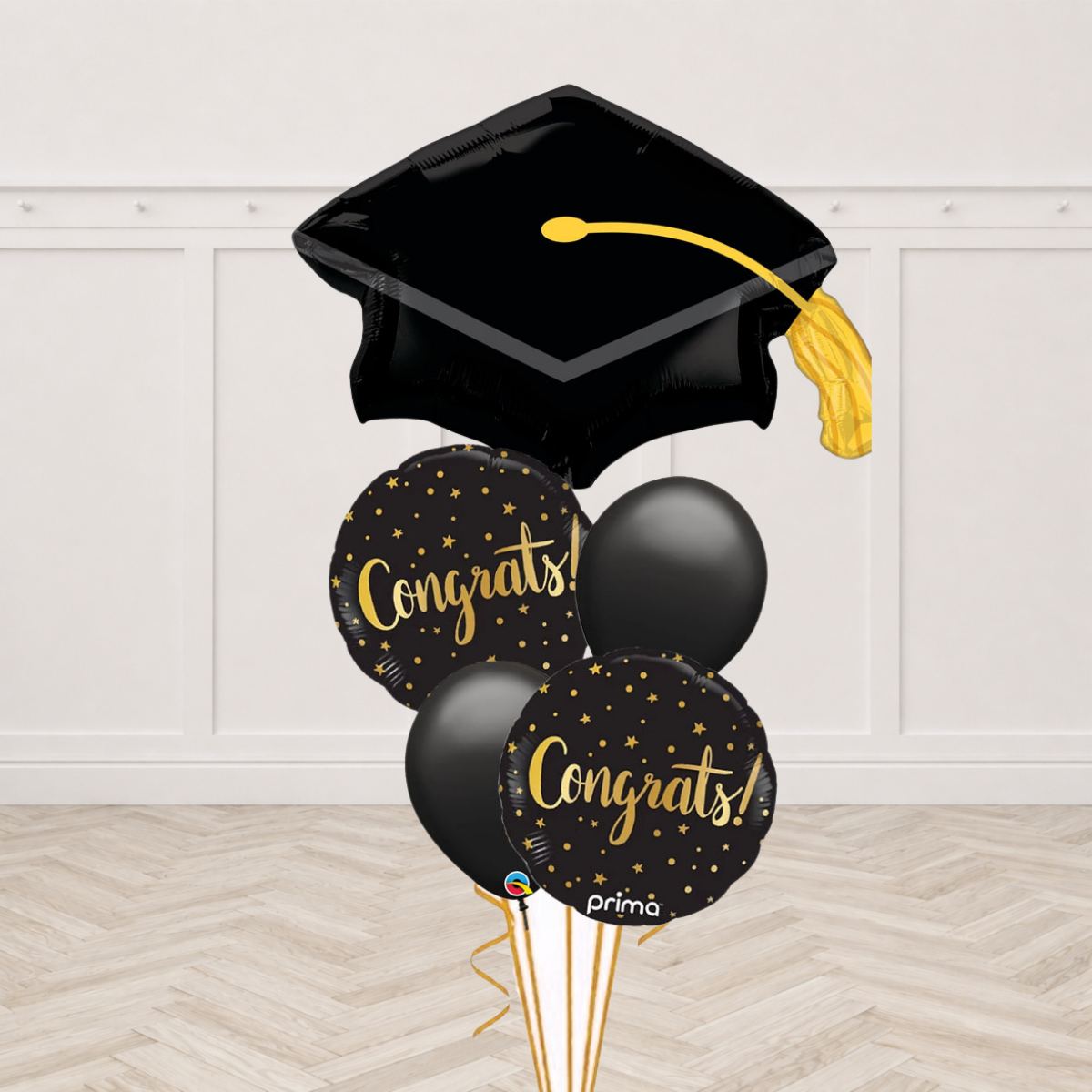 Graduation cap foil balloon with Congrats round foil balloons and black latex balloons