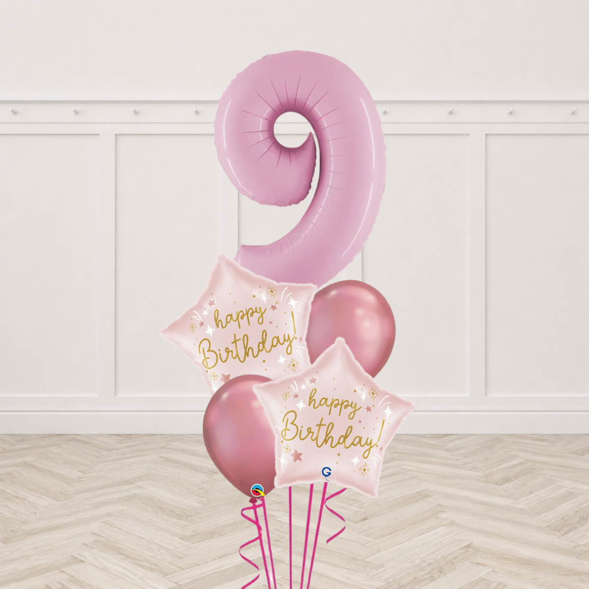 Pink number foil balloon with two pink Happy Birthday star foil balloons and two pink chrome latex balloons