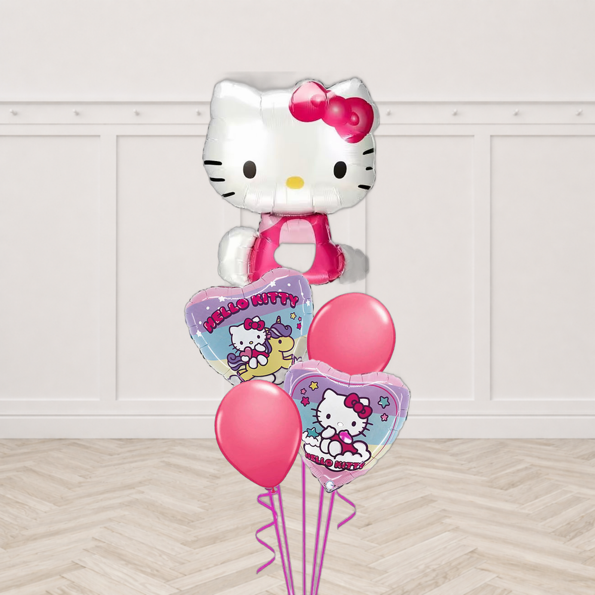 Hello Kitty shaped foil balloon with two Hello Kitty heart balloons and two plain pink round balloons