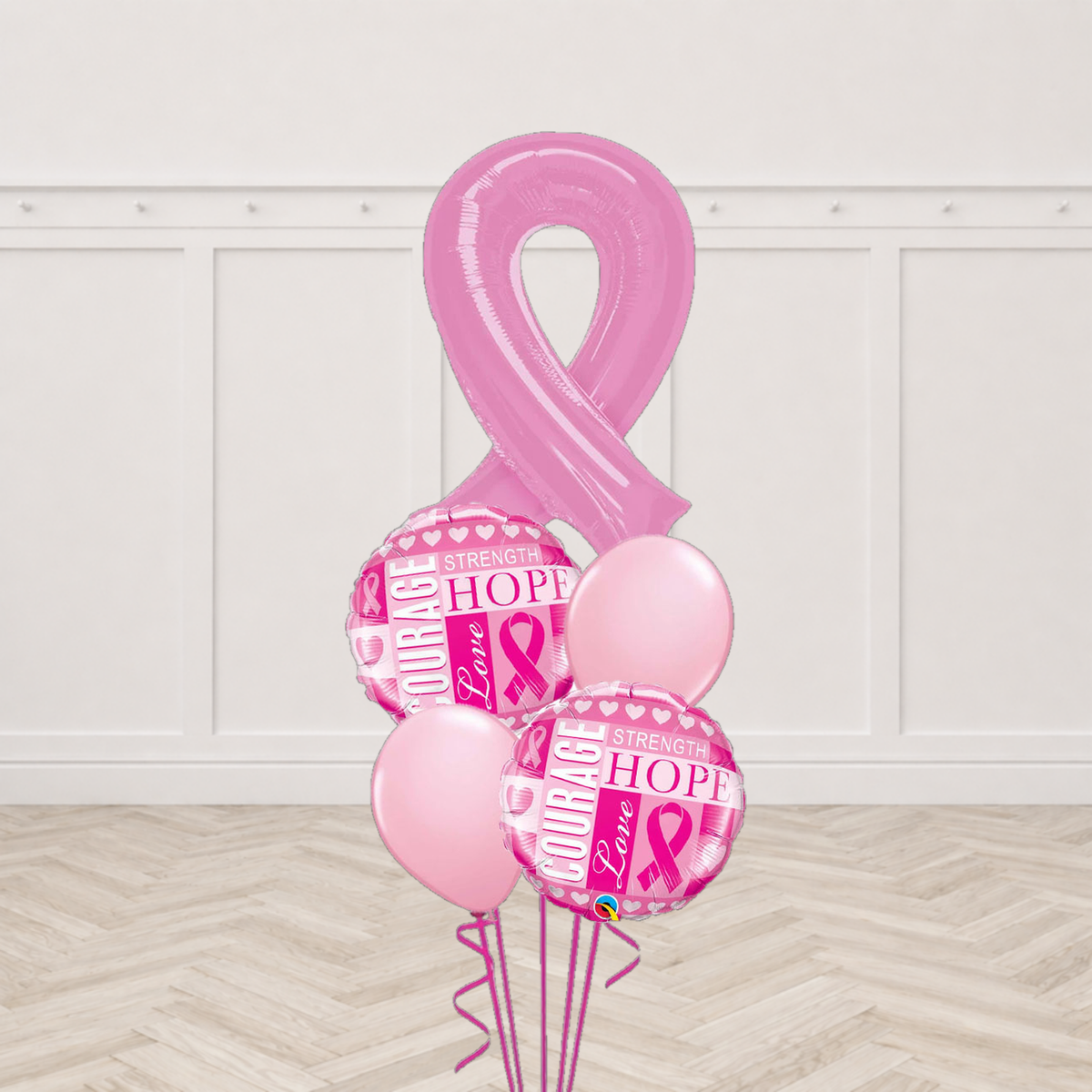 Pink breast cancer awareness ribbon foil balloon with two round foil balloons printed Courage Strength Hope Love and two pale pink round balloons