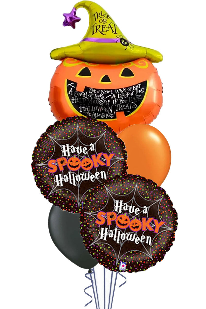 Halloween balloon bouquet with a pumpkin balloon in a Trick or Treat witch hat and two foil balloons printed Have a Spooky Halloween