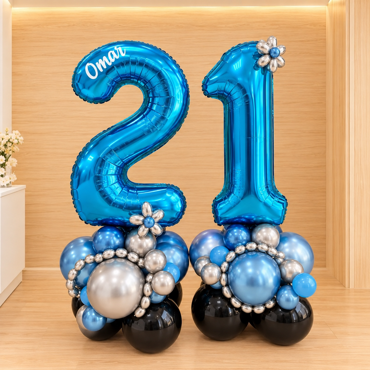 Blue number 2 and 1 foil balloons on chrome blue silver light blue and black latex balloon bases 