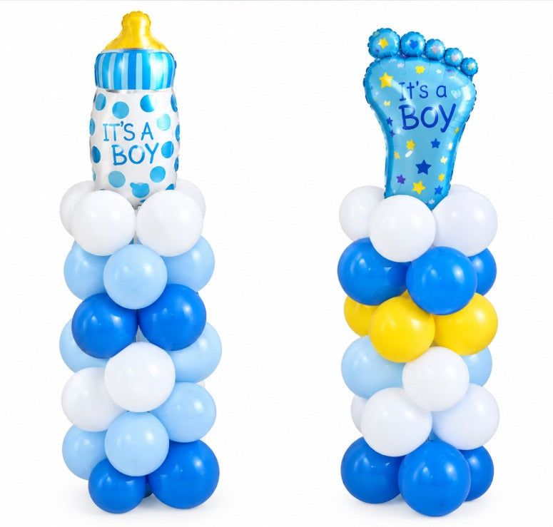 Two blue and white balloon pillars topped with It's a Boy baby bottle and baby foot foil balloons