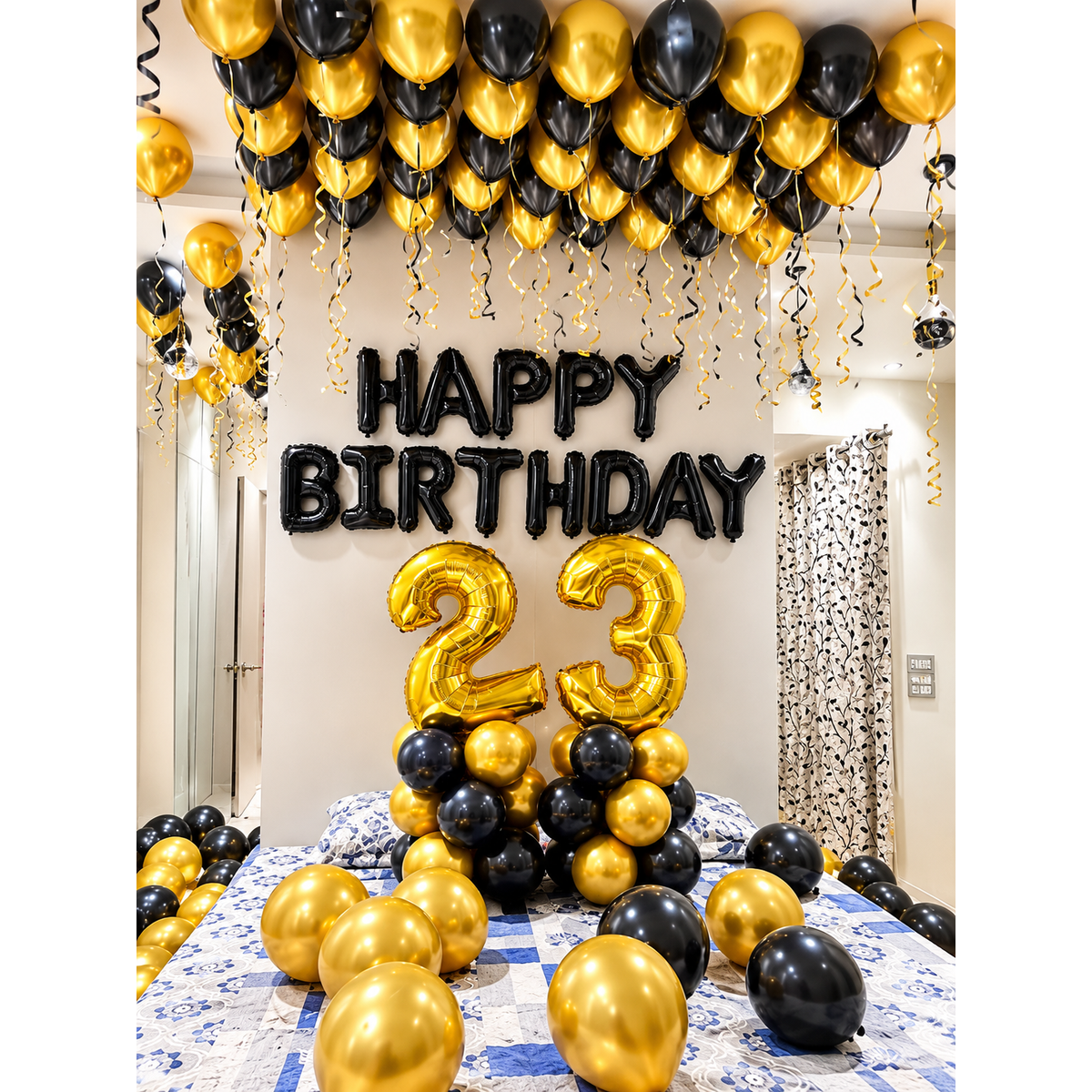 Black happy birthday letter banner with gold number foil balloons and gold black ceiling balloons