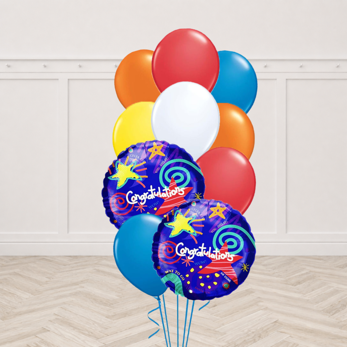 Two retro Congratulations foil balloons with orange, red, blue, yellow and white latex balloons