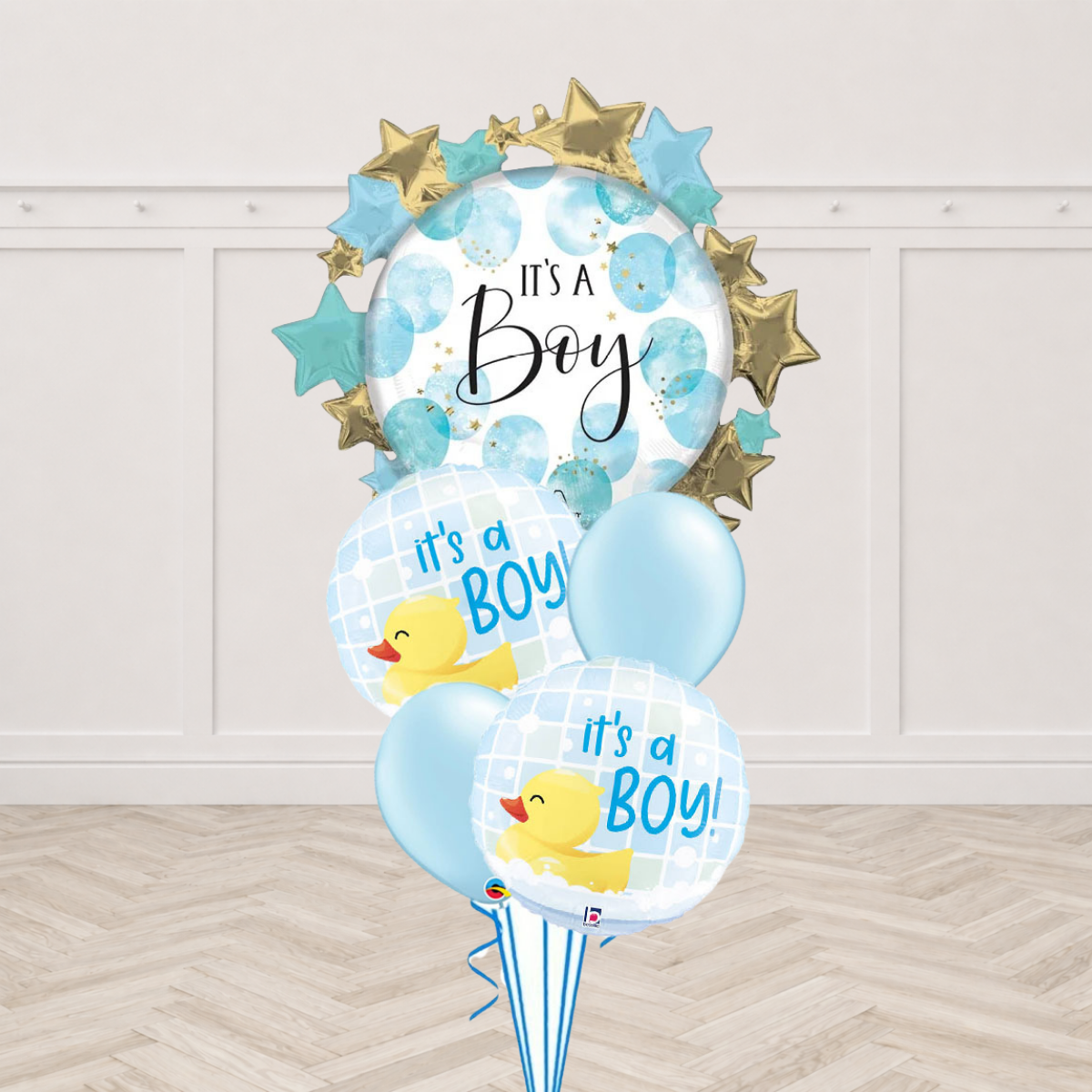 It's a Boy starburst foil balloon with rubber duck round foil balloons and light blue latex balloons