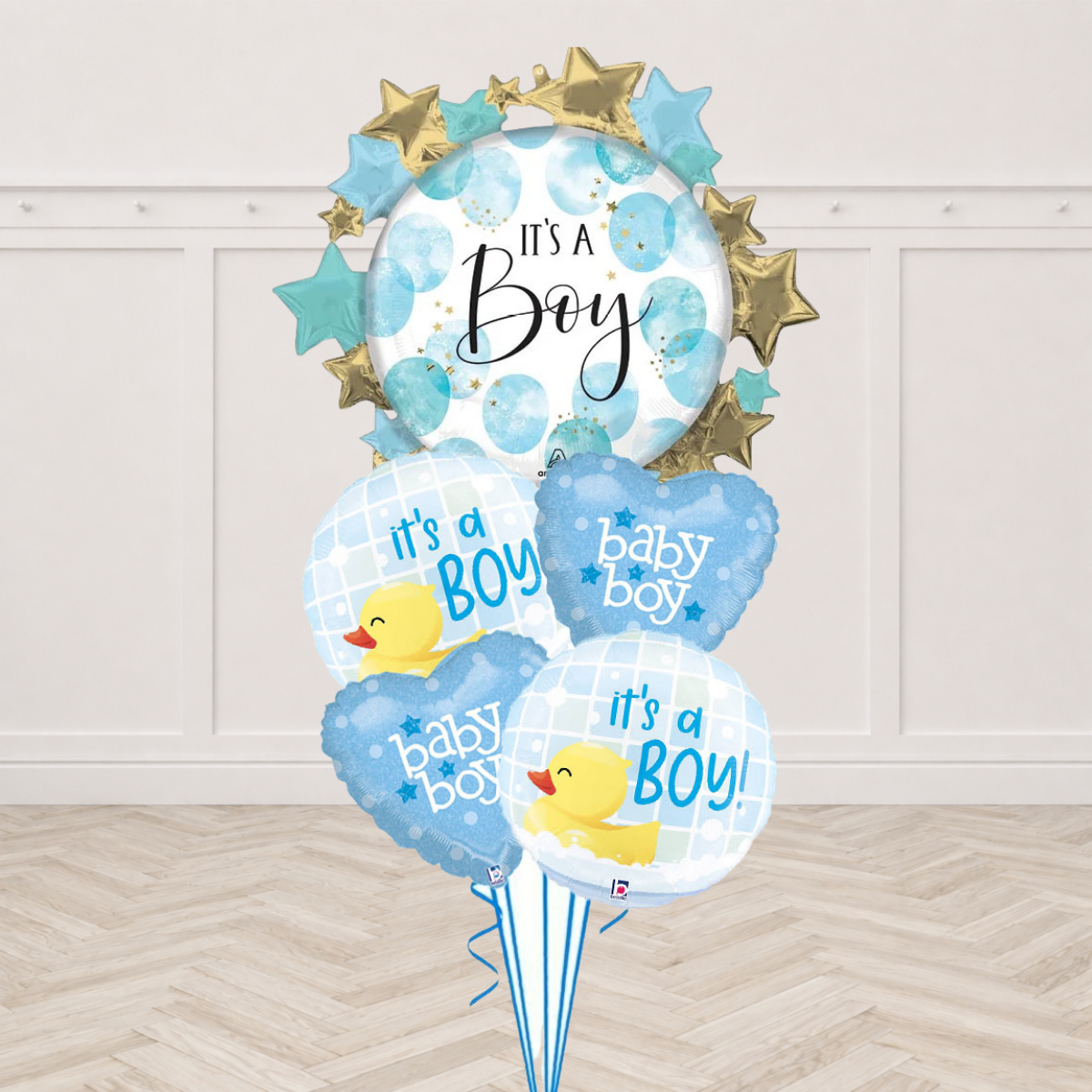 It's a Boy starburst foil balloon with rubber duck round foil balloons and Baby Boy heart foil balloons