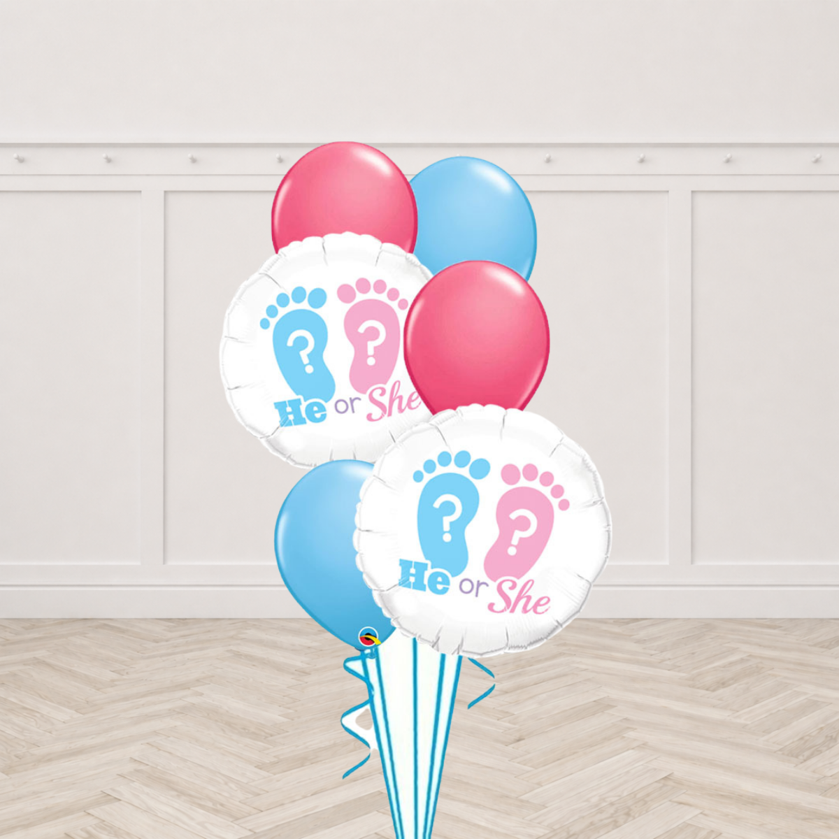 Two He or She gender reveal round foil balloons with pink and blue latex balloons