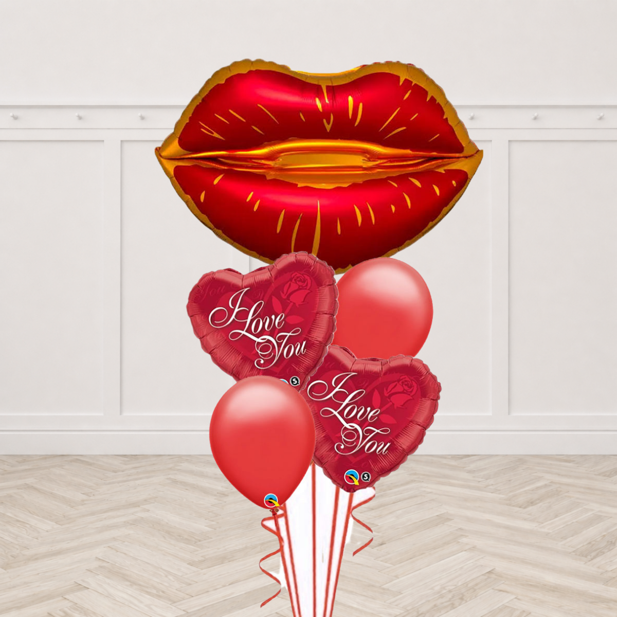 Red and gold kissy lips foil balloon with I Love You heart foil balloons and red latex balloons