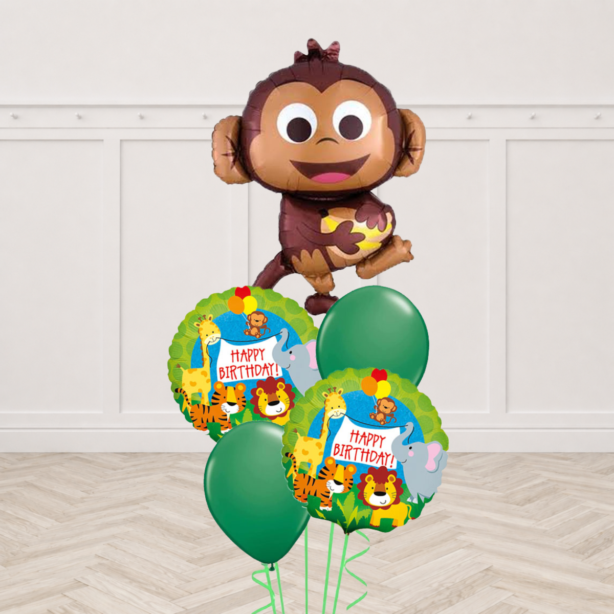 Brown monkey shaped foil balloon with two jungle animal Happy Birthday round foils and two green latex balloons