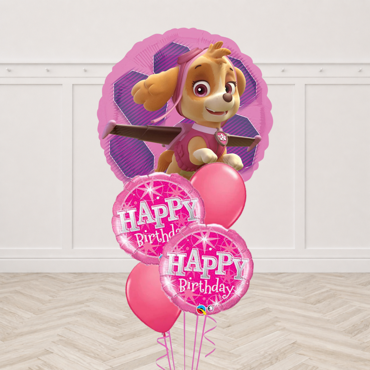 Paw Patrol Skye character round foil balloon with two pink sparkle Happy Birthday round foils and two pink latex balloons