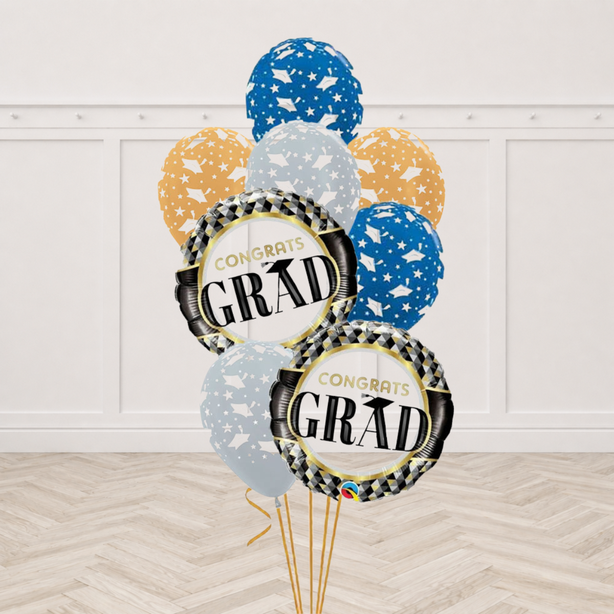 Two black and gold checkered Congrats Grad round foil balloons with six blue, gold and silver latex balloons