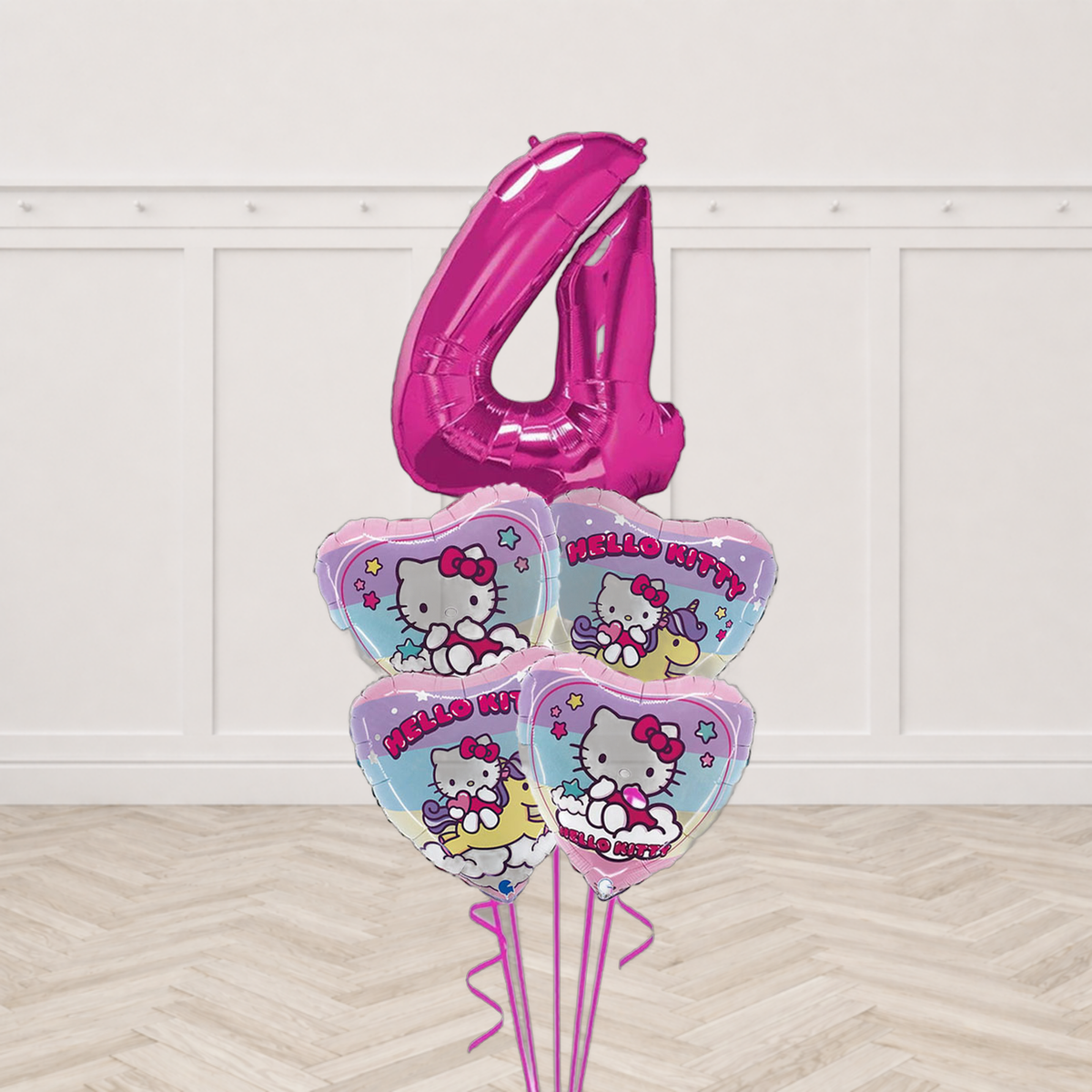 Hello Kitty birthday balloon bouquet with pink number foil balloon and four Hello Kitty heart foil balloons