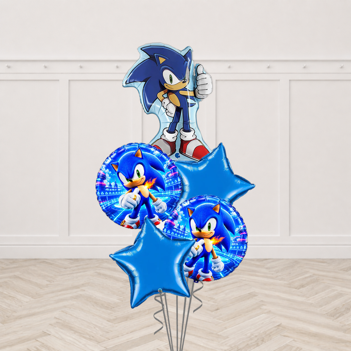 Sonic the Hedgehog shaped foil balloon with two blue star foil balloons and two round Sonic print balloons
