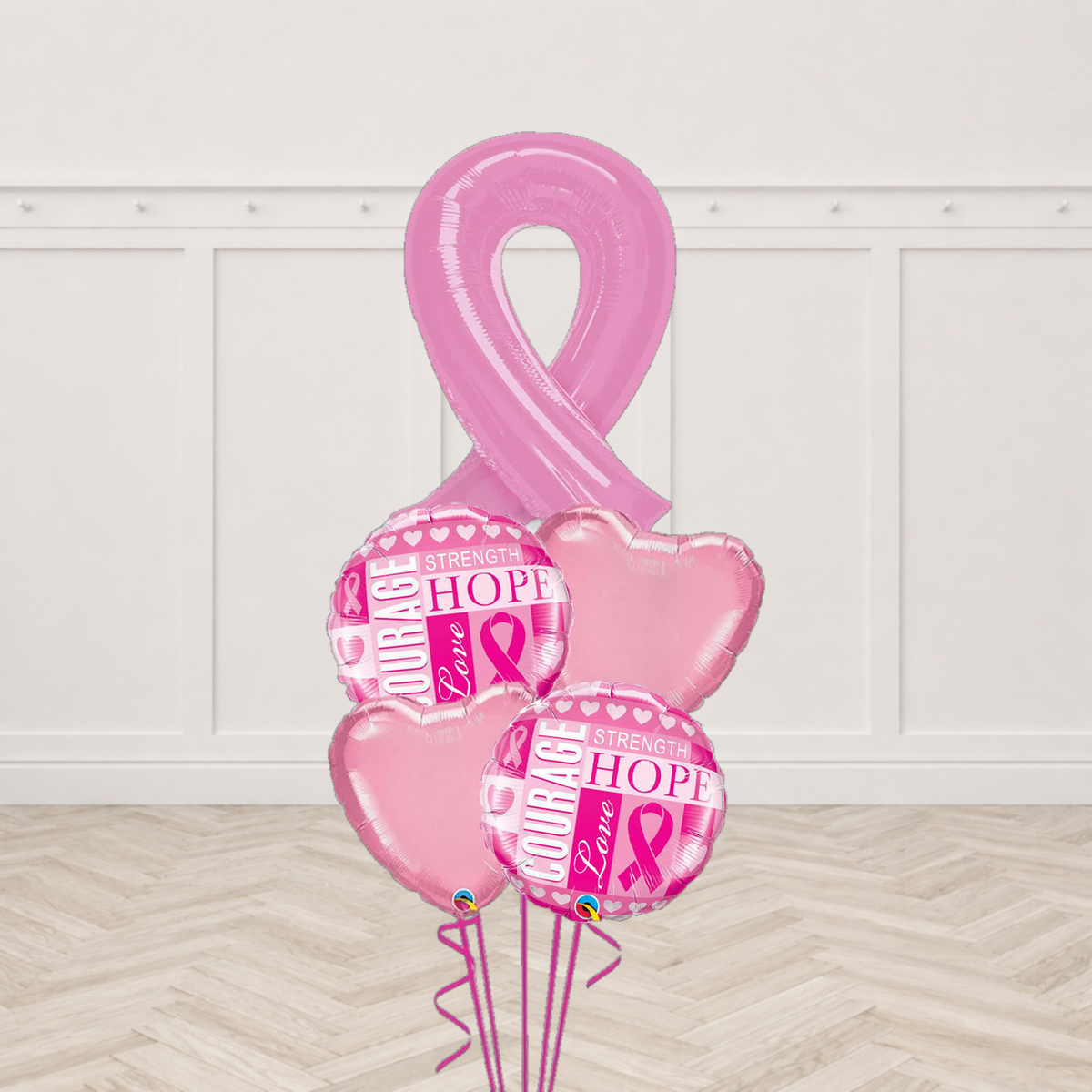 Pink breast cancer awareness ribbon foil balloon with two round foil balloons printed Courage Strength Hope Love and two pale pink heart balloons