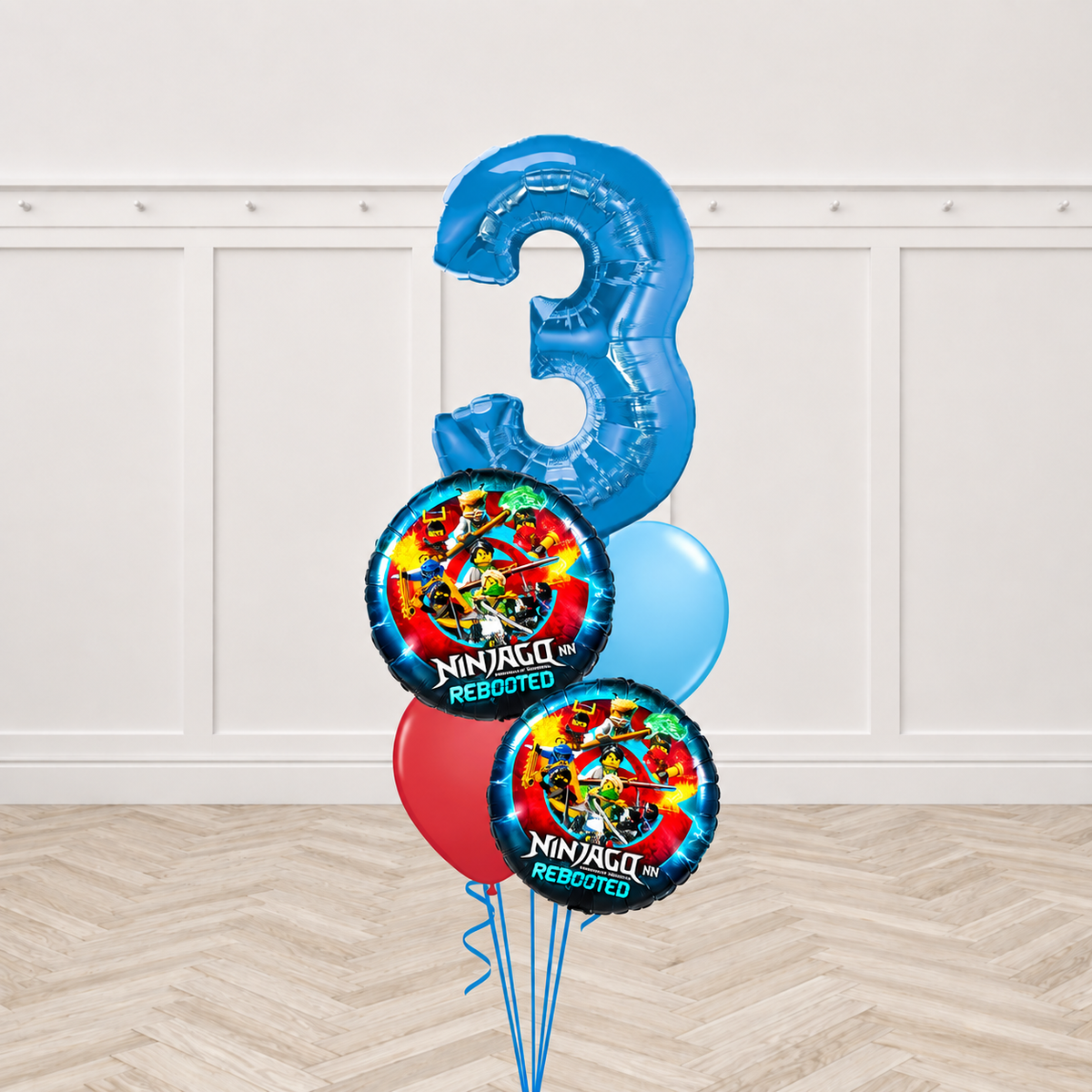 Blue number 3 foil balloon with two round Ninjago Rebooted print balloons, one red round balloon and one light blue round balloon