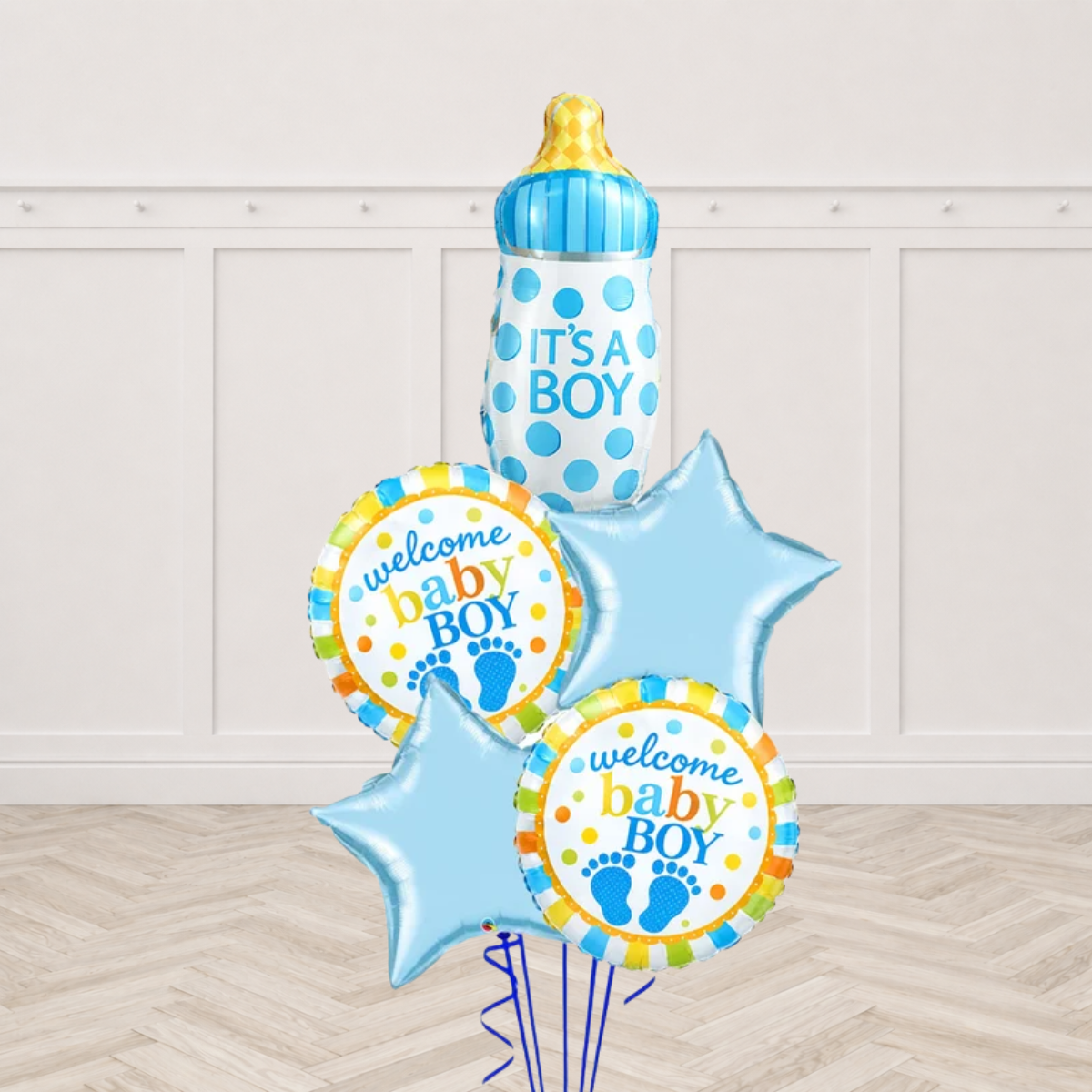 Baby bottle shaped foil balloon printed Its a Boy with two round Welcome Baby Boy foil balloons and two light blue star foils on blue ribbons