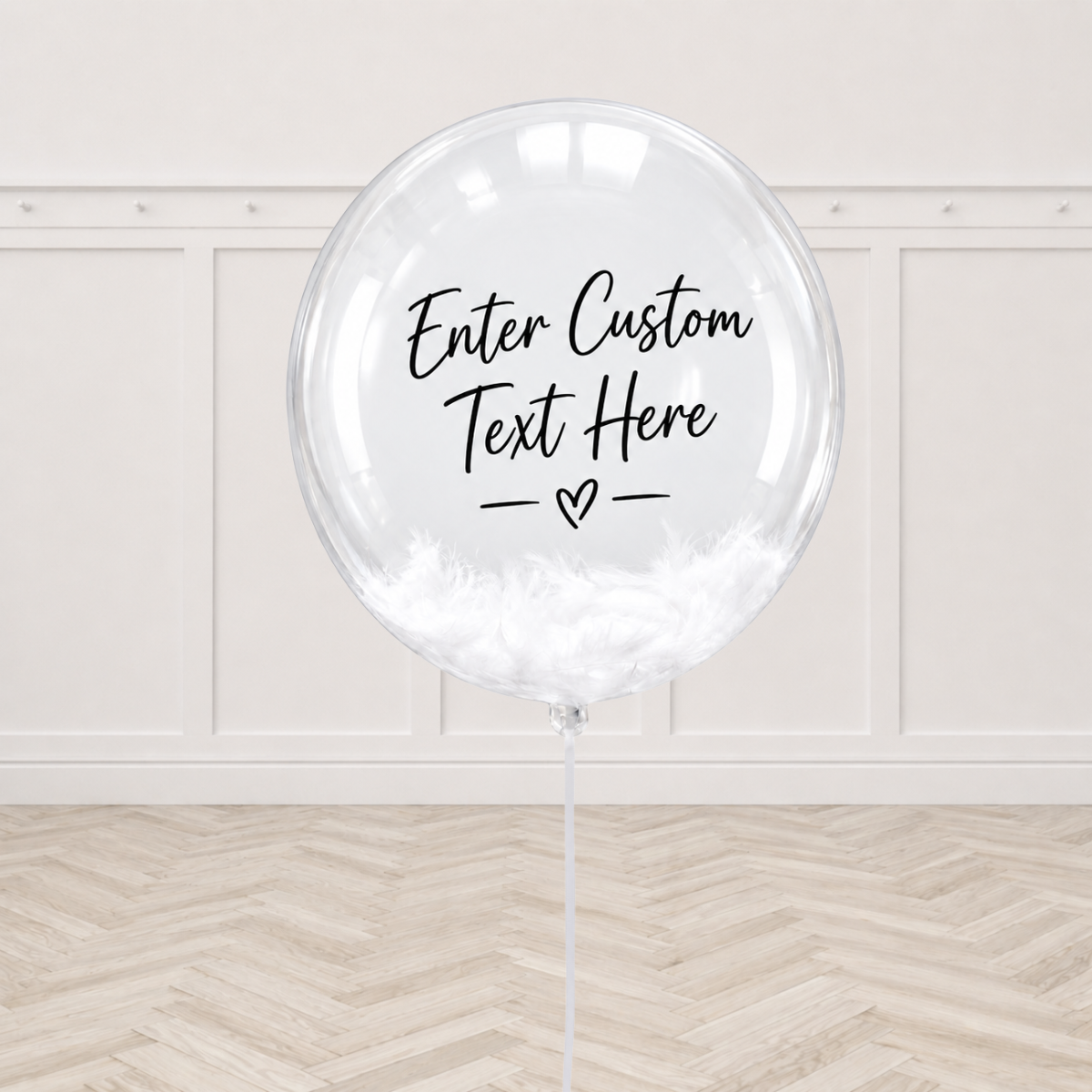 Clear bubble balloon with custom text and white feathers inside